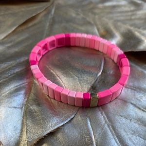 Brand new bracelet. Worn once. A tad too tight for wrist. Size M which fits 6.5